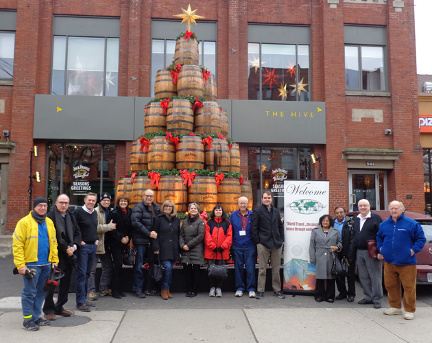 A group picture was taken in front of the Hive’s Jack Daniel’s barrel tree.