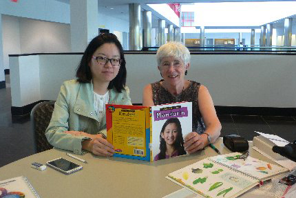 New York Coordinator Lynn Simmons is pictured at SUNY Story Brook with her “conversation partner,” Eva, from China.