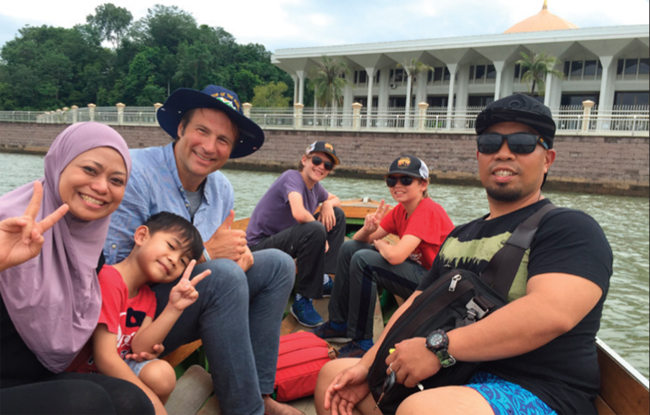 Dave Santulli, his boys Troy and Tristan, and some new friends are off to visit the world’s largest water village in Bandar Seri Begawan, Brunei.